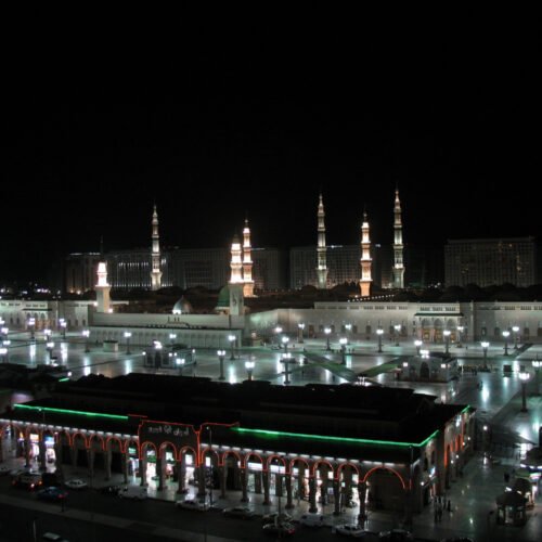 Al-Masjid an-Nabawi illuminated at night in Madinah