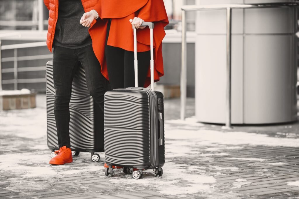 Traveller with luggage at airport